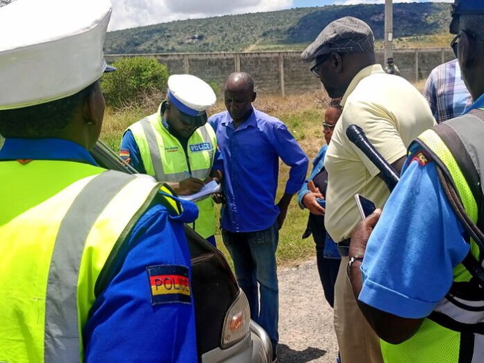 police officers and a team from ntsa during a roadcheck along the nairobi-mombasa highway on wednesday march 27, 2024