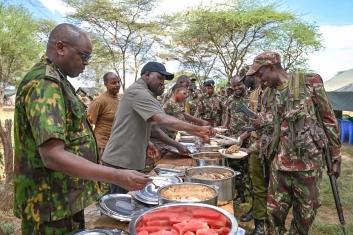 IMG_3529 Interior CS Kipchumba Murkomen shares a Christmas meal with frontline officers at Todo KDF Camp in Kolowa, Baringo County, thanking them for their service and sacrifices.