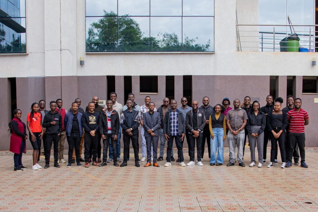 Kenyans.co.ke founder Robert Ndung’u poses with employees during the platform’s 10th anniversary celebrations, marking a decade of digital media innovation in Kenya.