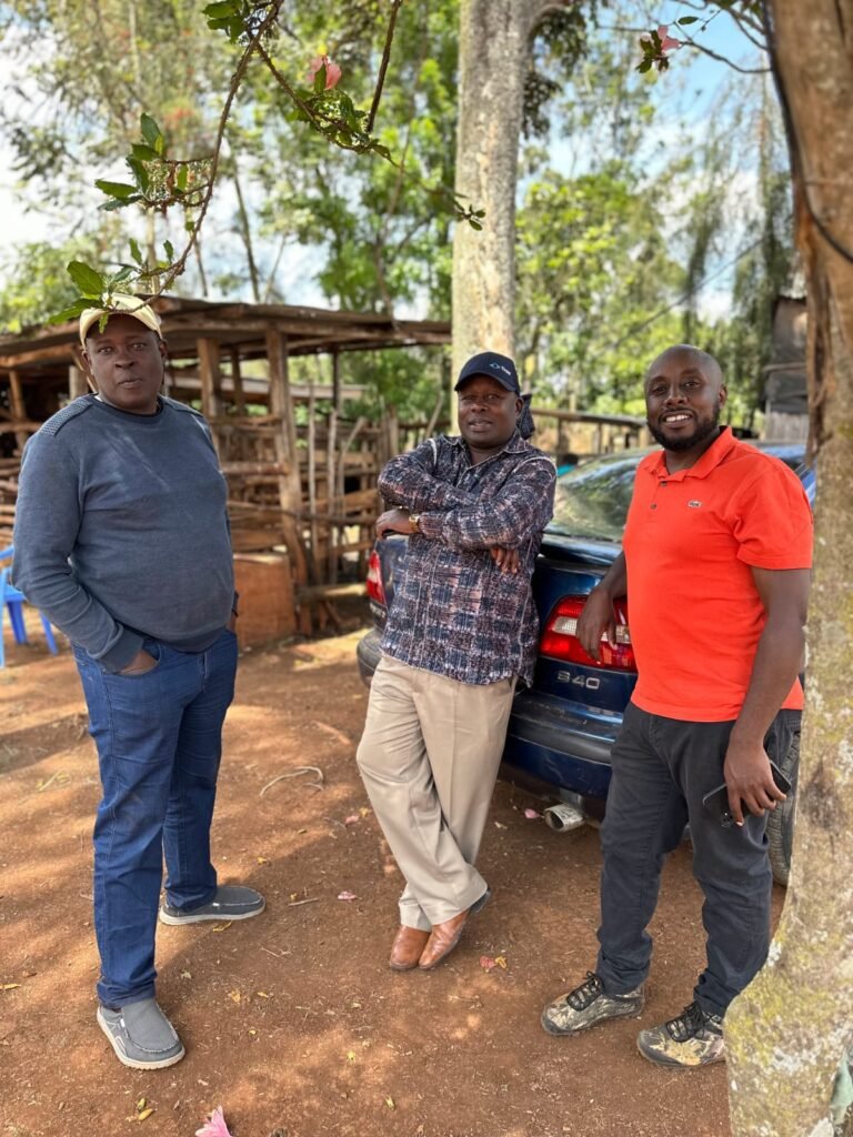 Ambrose Kimiti (in a red T-shirt) poses with relatives at a family gathering before leaving for Somalia, where he was later abducted. Photo/ Bernice Gathigia