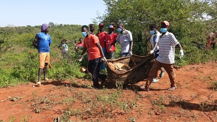 Residents of Mbeere South are in shock after the mutilated body of a missing man was found hanging from a tree, with police suspecting murder staged as suicide and family members detained.