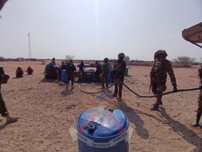 G_pMLA1XIAAYfzr KDF personnel deliver water to drought-hit Hubsoy residents in Wajir.