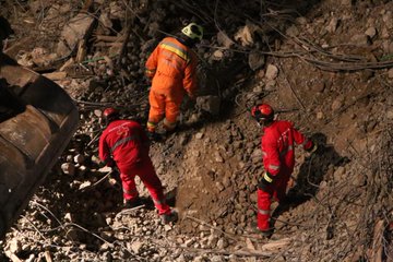 Emergency responders conduct search and rescue operations at the site of a collapsed multi-storey building in South C, Nairobi, as authorities cordon off the area and assess nearby structures for safety.