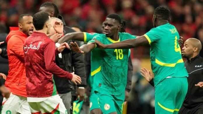 A snapshot of the intense on-field battle between Senegal and Morocco during the AFCON final.
