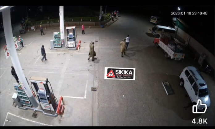 CCTV-NYERI KILLING Screenshot from CCTV footage showing the moment a police officer allegedly shot businessman George Gathu Matheri in Karatina, Nyeri County.