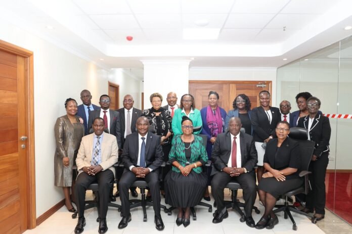 Treasury-Judiciary National Treasury Cabinet Secretary John Mbadi and Chief Justice Martha Koome during a meeting between Treasury and Judicial Service Commission leaders at Pension Towers, Nairobi.