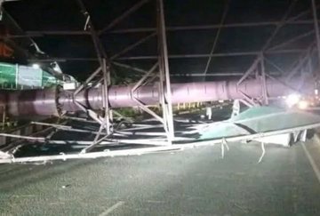 Billboard Collapsed A collapsed roadside billboard lies across Ngong Road after falling onto an Uber vehicle in the early hours of Sunday, trapping the driver and a passenger as emergency teams respond.