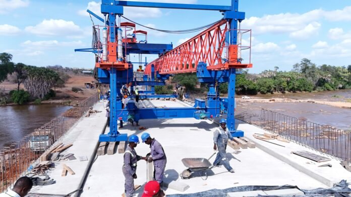 Construction personnel at work on the bridge