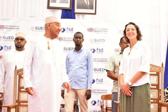 Lamu Cocunt Plant Governor Issa Timamy joins UK officials and Kentaste directors during the commissioning of the new coconut processing plant in Lamu County on February 13, 2026.