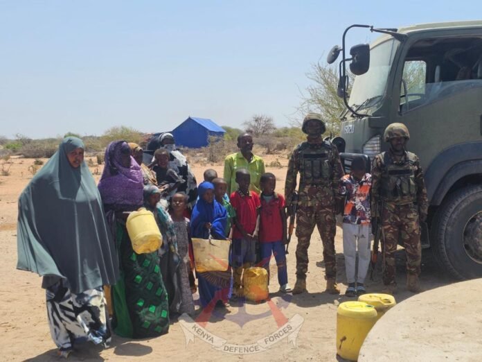 IMG-20260203-WA0013 Kenya Defence Forces troops deployed in the Diff area recently conducted a Civil–Military Cooperation humanitarian operation to deliver emergency water supplies to residents of Abaqhalul Centre in Wajir South Sub-County.