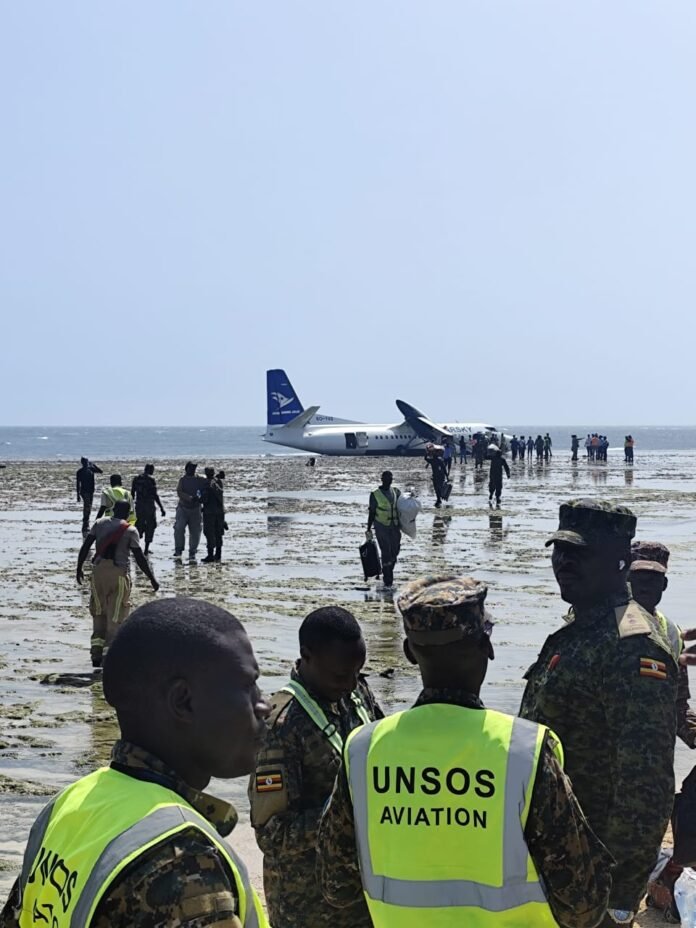 Mogadishu, Somalia Emergency responders evacuate passengers after a Starsky Aviation aircraft crash-landed into the sea near Aden Adde International Airport in Mogadishu following a mechanical failure.