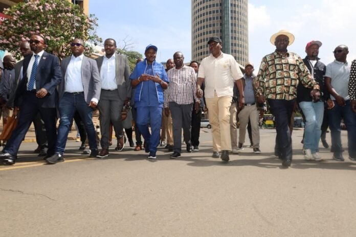 Opposition Leaders Opposition leaders walk through Nairobi en route to the IG’s office demanding accountability over the ACK Witima church attack.