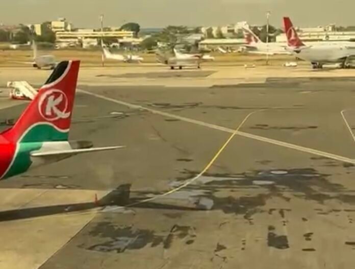 Aircraft grounded on the tarmac at Jomo Kenyatta International Airport as flight disruptions continue amid the KCAA workers’ strike.