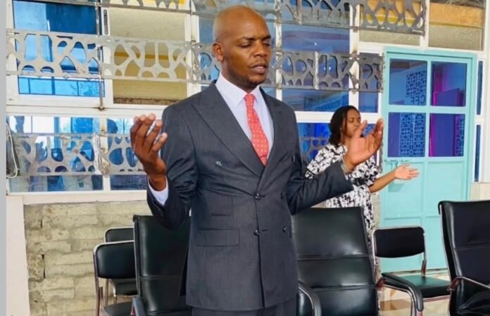Jimmy Gait Gospel musician Jimmy Gait in prayer during a past church service. (File photo)