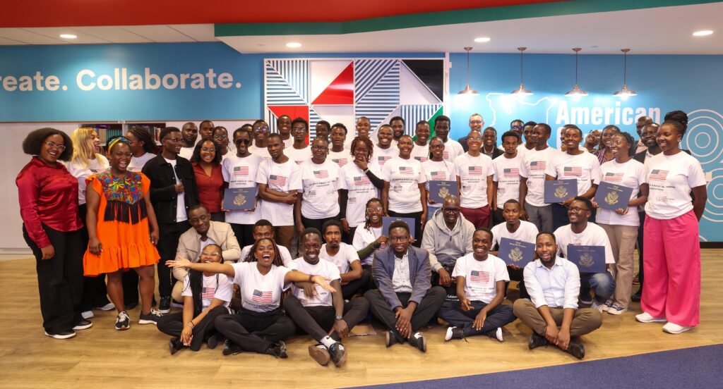 Participants of the U.S.–Kenya Red, White and Build Hackathon in Nairobi pose together, showcasing their AI innovations and celebrating the winners of the cash prizes.
