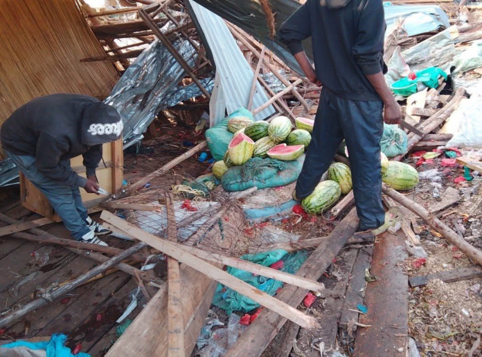 A small-scale trader salvages what remains of his kiosk after demolitions in Githurai along Thika Road on February 19, 2026. Photo/Courtesy