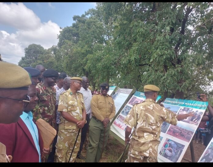 468daffc-77f3-4b3d-bb4c-c29f0b3c1f60 KWS offices take the Meru county commissioner through various exhibitions during the World Wildlife Day at Ndoleli Primary School on Tuesday, March 3, 2026.