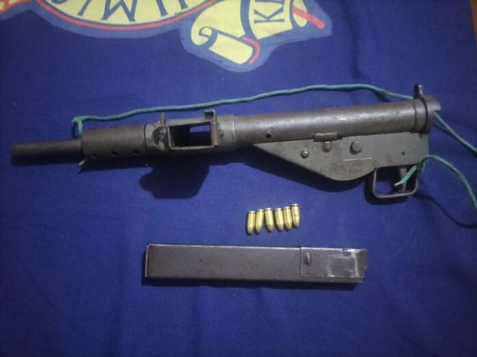 Pachet submachine gun Detectives arrest ex-convict Jason Kobia Mucoka in Meru County over violent robberies. Police recover submachine gun hidden in miraa plantation.