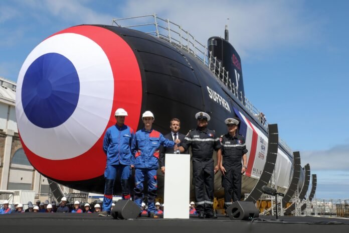 France Nuclear Heads ScanpixFrench President Emmanuel Macron attends the official launch ceremony of the new French nuclear submarine "Suffren" in Cherbourg, north-western France on July 12, 2019.