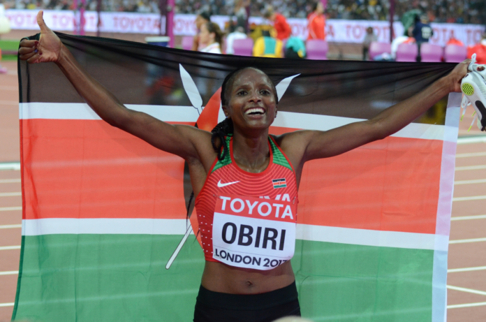 Kenya’s Hellen Obiri sets a new course record of 1:06:33 to win the 2026 United Airlines NYC Half Marathon ahead of Sharon Lokedi.