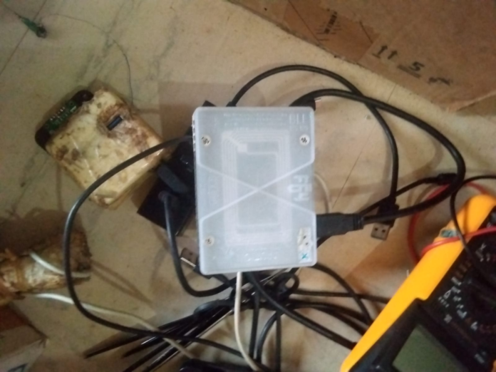 image A total of 213 mobile phones of assorted makes and models were recovered, alongside a Pandora machine suspected to be used in mobile phone reprogramming