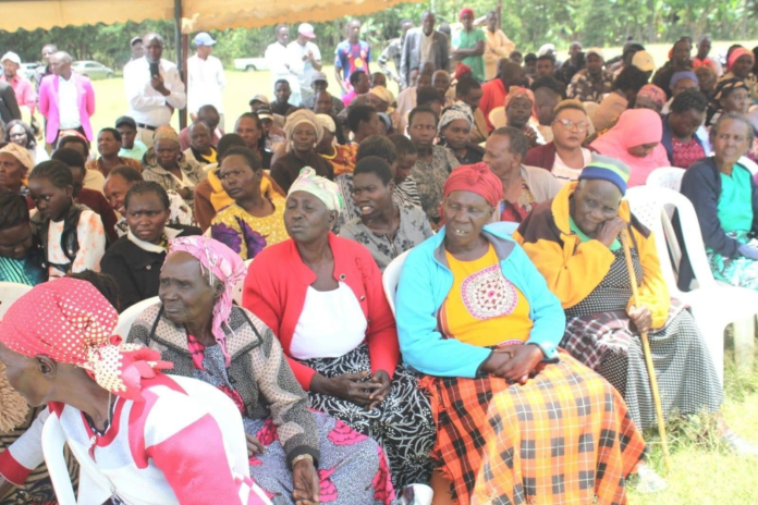 manzini-uasin-gishu-residents-demand-title-deeds Residents of Manzini settlement in Turbo Constituency, Uasin Gishu County attend a meeting with the National Assembly’s Departmental Committee on Environment, Forestry and Mining at Manzini Junior Primary School grounds on March 28, 2026, to push for the issuance of long-awaited land title deeds.