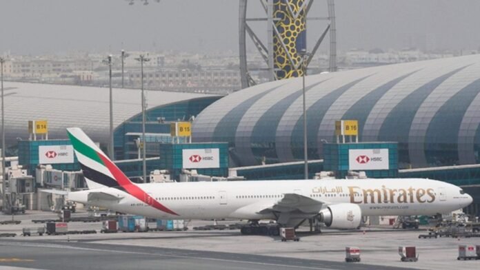 dubai emirates dubai airport Dubai Airports confirms limited evening resumption of flights at DXB and DWC, urges passengers to wait for airline confirmation.