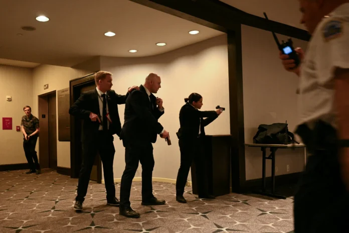 Trump evacuated after gun scare at major DC event.