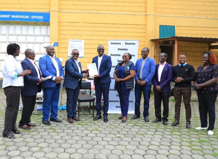 Dr. Moses Kitheka, Chief of Party Deloitte & Touche LLP – Tujenge Jamii project, hands over medical equipment to Nakuru County Acting CECM for Health, Stephen Kuria. The equipment, supported by the United States Government, will strengthen maternal, newborn, and child health services.