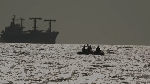 Somali Pirates Cargo ship hijacked by suspected pirates off Somalia coast being steered toward shoreline