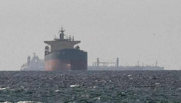 image A US-sanctioned Chinese tanker passes through the Strait of Hormuz despite a blockade, raising concerns over enforcement and global oil supply risks.