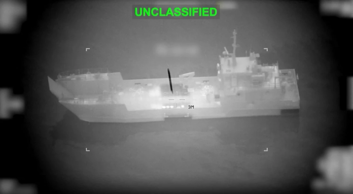 image Screen grab obtained from video released by the US Central Command on their X account @CENTCOM on March 10, 2026 shows what they say is an Iranian naval vessel as it is struck by a projectile "near the Strait of Hormuz" as part of "Operation Epic Fury" on March 10, 2026.