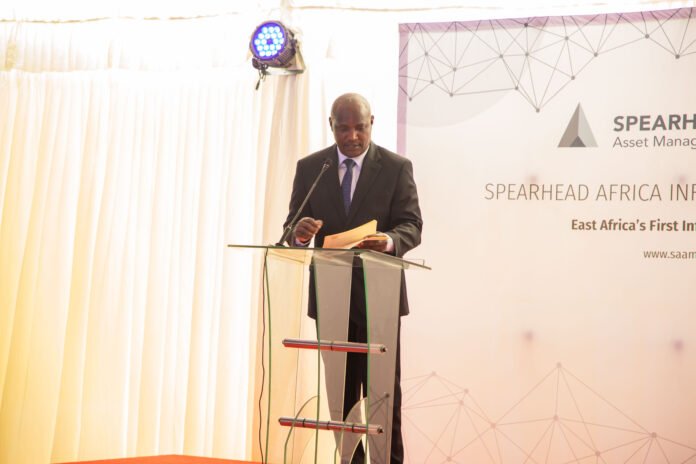 Treasury Cabinet Secretary John Mbadi speaks during the listing ceremony of the Spearhead Africa Infrastructure Fund (SAIF) at the Nairobi Securities Exchange in Nairobi.