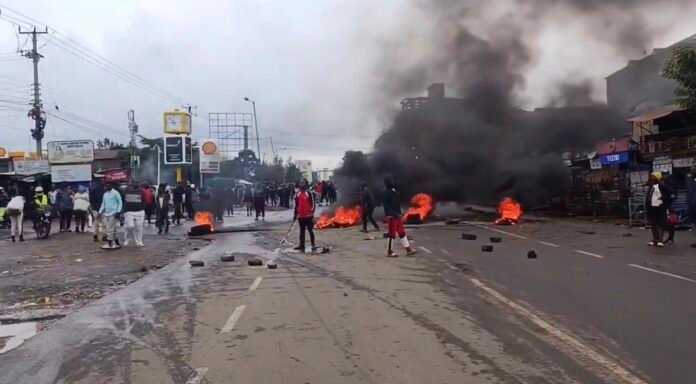 Residents engage in running battles with police during protests in Kawangware over soaring fuel prices and the nationwide matatu strike.