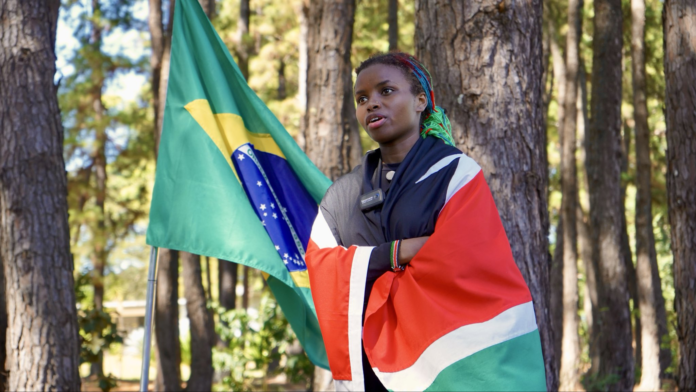 image Kenyan environmentalist Truphena Muthoni hugged 1,234 trees in one hour in Brazil, provisionally breaking the Guinness World Record.