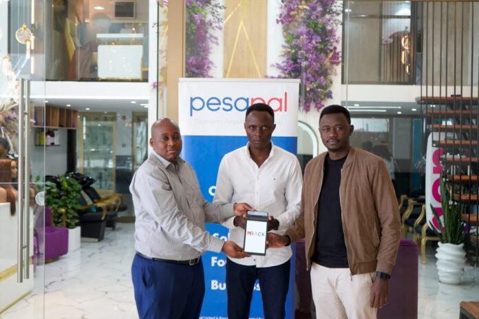 Pesapal From left, Kevin Khaemba Chief-Commercial Offier Pesapal, Ferdinand Eloto-CoFounder Rack & Derrick Matheka-Co Founder Rack at Lana Plaza, Nairobi