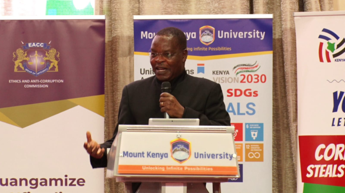 EACC Chairperson, Dr David Oginde, speaking during the launch of the Ethics and Integrity Club at Mount Kenya University in Thika, Kiambu County. EACC has intensified anti-corruption efforts by targeting university students, urging them to reject fraud, plagiarism and corruption through integrity clubs.