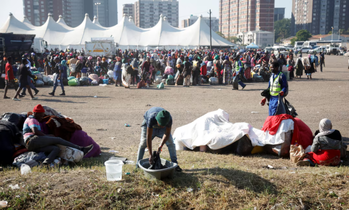 Thousands of migrants are leaving South Africa ahead of an anti-migrant deadline, with many forced to separate from their families amid fears of violence.