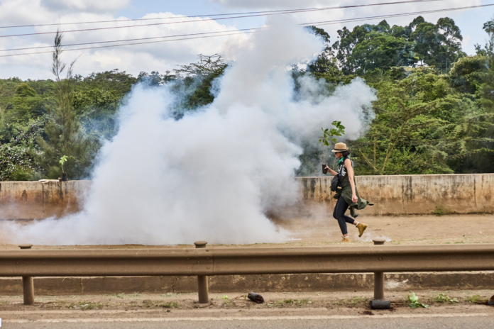 Boniface Mwangi Nairobi Park Boniface Mwangi criticises police conduct during Nairobi National Park protests and urges greater participation in governance and conservation campaigns.