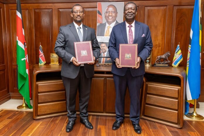 Musalia Mudavadi signs a revised host country agreement with AATF to strengthen agricultural innovation, food security and support smallholder farmers in Kenya.