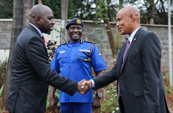 Murkomen-Police Interior Cabinet Secretary Kipchumba Murkomen shakes hands with DCI Director Mohamed Amin at the DCI headquarters on July 23, 2026, as Inspector General of Police Douglas Kanja looks on. The meeting came amid heightened focus on security and the government’s response to rising concerns over criminal gangs and political violence.