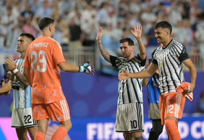 Argentina's goalkeeper #23 Emiliano Martinez, forward #10 Lionel Messi and goalkeeper #12 Geronimo Rulli celebrate after winning the 2026 World Cup Group J football match between Argentina and Algeria at the Kansas City Stadium in Kansas City on June 16, 2026. Lionel Messi returns to his adopted home of Miami as Argentina face Cape Verde in the World Cup last 32 after a record-breaking group stage.
