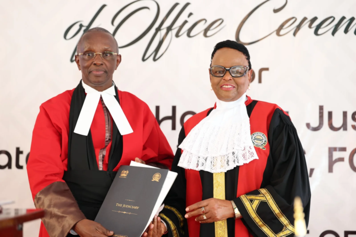 CJ Martha Koome hands over the proclamation documents to Judge Gatembu Kairu following his swearing-in as the new President of the Court of Appeal. Chief Justice Martha Koome has challenged the Court of Appeal to determine appeals within one year as newly installed Court of Appeal President Justice Gatembu Kairu pledges to reduce a backlog of more than 16,000 pending cases.