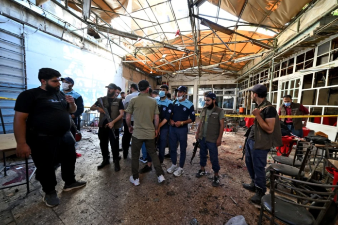 Damascus café bombing The death toll from a bomb blast at a café in Damascus has risen to 10, with 21 others injured as Syrian authorities investigate the deadly attack.
