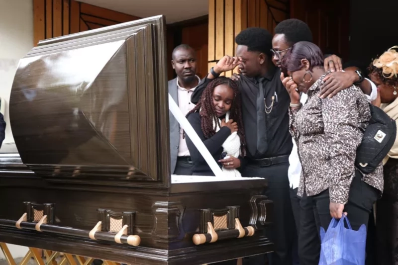 Family members and mourners during the memorial service of slain psychiatrist Dr Victoria Mutiso at CITAM Valley Road Church in Nairobi.