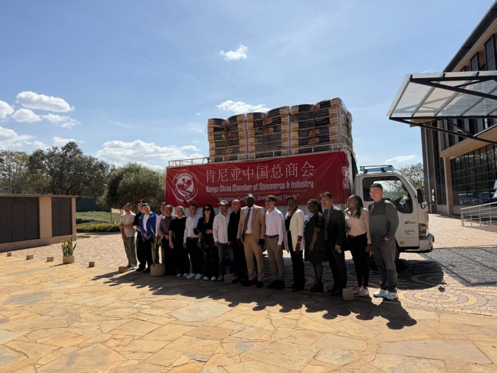 Kenya China Chamber of Commerce and Industry Chairman Tim Chen joins representatives during the handover of specialised beds to the Kenya Women and Children Wellness Centre in Nairobi.